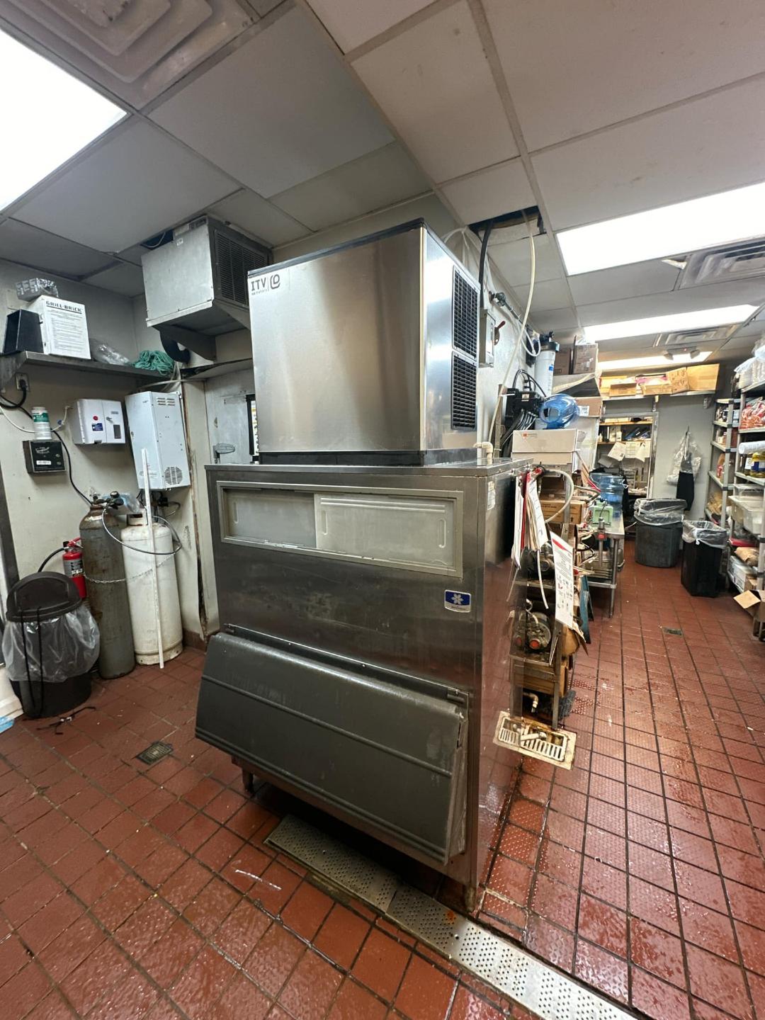 Commercial ice machine in restaurant kitchen